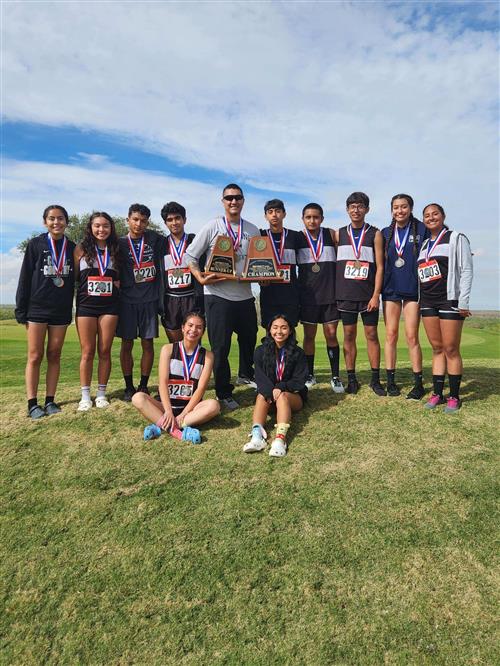 Cross Country team holding District Titles